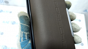 Front panel trim center lower Porsche Macan 15-18 brown leather, scratches