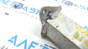 The fang of the lower reinforcement of the front bumper left Toyota Prius 50 16-22 is crushed, torn