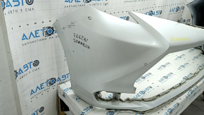 Front bumper bare Toyota Sienna 21-25 white, scratches, bumps, cracks in fasteners