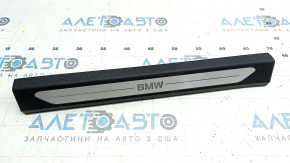 Door sill trim front left BMW X5 G05 19-23 black with chrome insert BMW, backlight, scratches