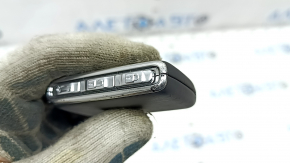 Volvo XC40 19-25 keyless key, 4 buttons, black leather with chrome, chrome peeling, scratches
