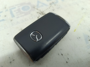Mazda CX-5 20-24 keyless key, 4 buttons, worn