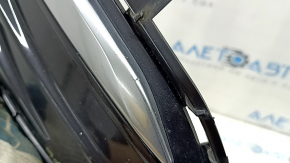Front bumper grille left Ford Edge 19-24 under fog lights, black gloss with chrome molding, sand