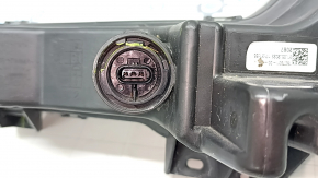 Tesla Model Y 20-25 right fog light with broken mount, scratches, and sand