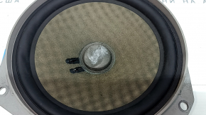 The front left door speaker of the Fiat 500L 14 is dented.