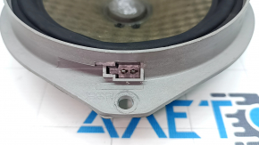 The front left door speaker of the Fiat 500L 14 is dented.