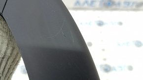 The right trunk lid hinge trim for a BMW 3 G20 19-24 is worn and scratched.