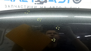 The bare hood of a Ford Escape MK3 2017-2019, aluminum, graphite J7, nicks, and chips.