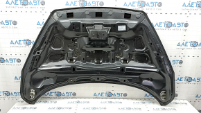 The bare hood of a Ford Escape MK3 2017-2019, aluminum, graphite J7, nicks, and chips.
