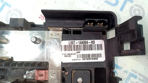The underhood fuse box housing of a Ford Escape MK4 20-25 has a broken mount.