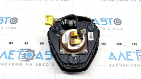 Steering wheel airbag for the driver's side of a Tesla Model 3 18-inch black, rusty, worn.