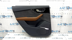 The door panel, rear left, Audi Q7 16-19, is black, the bottom is black leather, the armrest is brown leather, the insert is black Alcantara, Bose, under the curtain with a handle and overlay is black