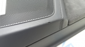 The door panel, rear left, Audi Q7 16-19, is black, the bottom is black leather, the armrest is brown leather, the insert is black Alcantara, Bose, under the curtain with a handle and overlay is black