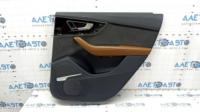 The door panel, rear right, Audi Q7 16-19, is black, the bottom is black leather, the armrest is brown leather, the insert is black Alcantara, Bose, under the curtain with a handle and overlay is blac