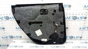 The door panel, rear right, Audi Q7 16-19, is black, the bottom is black leather, the armrest is brown leather, the insert is black Alcantara, Bose, under the curtain with a handle and overlay is blac