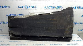 Right underbody protection for Audi Q5 80A 18-24 is dented and torn.