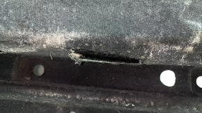 Right underbody protection for Audi Q5 80A 18-24 is dented and torn.