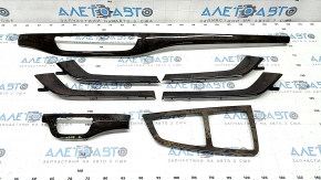 A set of interior trims for the Audi Q7 16-19 in dark wood, type 2, scratches, faded center console trim