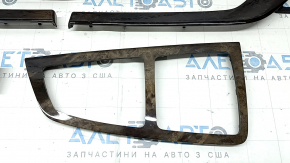 A set of interior trims for the Audi Q7 16-19 in dark wood, type 2, scratches, faded center console trim