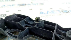 The right front bumper mount on a Toyota Prius V 12-17 has broken latches.