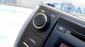 The display radio disc player of the Toyota Camry v55 15-17 USA has worn buttons.