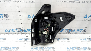 Left headlight for a 1997 Subaru Forester with wiring.