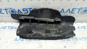 The lower control arm cover under the rear left spring of the Audi Q5 80A 18-24 is dented, worn, and has tears.