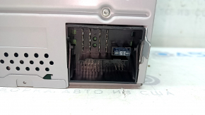 The paint on the VW Passat b7 12-15 USA radio is peeling.