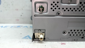 The paint on the VW Passat b7 12-15 USA radio is peeling.
