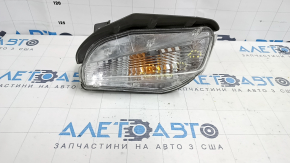 Left turn signal for a 1992 Toyota Prius V, sand and scratches.
