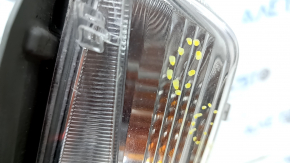 Left turn signal for a 1992 Toyota Prius V, sand and scratches.