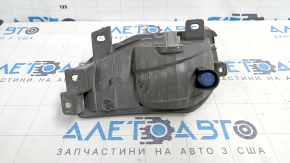 Right turn signal for a 1992 Toyota Prius V, sand and scratches.
