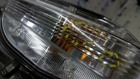 Right turn signal for a 1992 Toyota Prius V, sand and scratches.