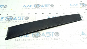 The front right side door trim for a Toyota Prius V 12-17 has broken fasteners.