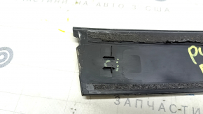 The front right side door trim for a Toyota Prius V 12-17 has broken fasteners.
