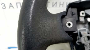 Naked steering wheel for a Toyota Prius V 12-17, black rubber, worn, needs cleaning.