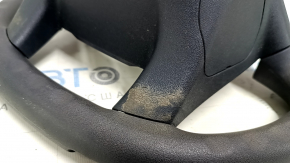 Naked steering wheel for a Toyota Prius V 12-17, black rubber, worn, needs cleaning.