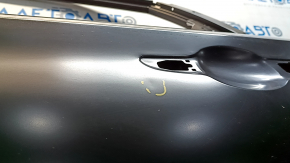 The rear left door of a Hyundai Sonata 15-19 is bare, with a small dent.