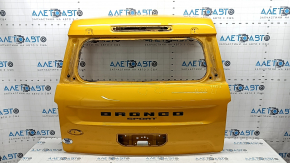 The tailgate is bare, 2021-2025 Ford Bronco Sport orange SB, dents
