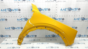 Front right fender of a 2015 Ford Bronco Sport, orange SB, bumps, dent