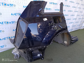 The quarter panel of the rear right wing of an Audi Q7 16-25 is sawn off, blue, the side member is dented, the filler has come off