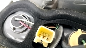 Right headlight of a 1992 Toyota Prius V, pre-restored, scratches, sand