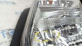 Right headlight of a 1992 Toyota Prius V, pre-restored, scratches, sand
