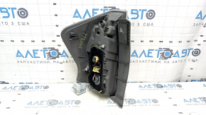 Right headlight of a 1992 Toyota Prius V, pre-restored, scratches, sand