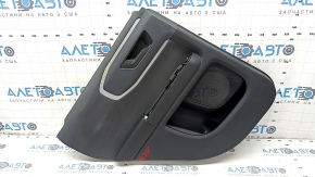 Black rear left door panel for a 2021 Ford Bronco Sport with a handle, gray molding, black leather armrest, plastic insert, scratches, worn, whitened plastic