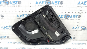 Black rear left door panel for a 2021 Ford Bronco Sport with a handle, gray molding, black leather armrest, plastic insert, scratches, worn, whitened plastic