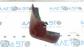 The front left mudguard of a Nissan Leaf 11-17 is worn and the fasteners are torn.