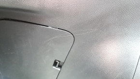 Left Nissan Leaf 13-17 black arch trim, scratches