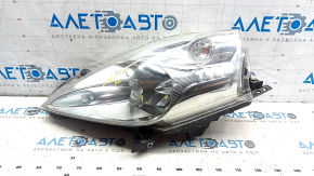 Left front headlight for Nissan Leaf 13-17 halogen, without mounting, white cap, spider web, scratches
