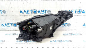 Left front headlight for Nissan Leaf 13-17 halogen, without mounting, white cap, spider web, scratches